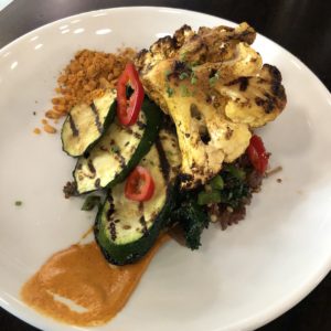 The grilled cauliflower entree at SOU offers a symphony of harmonious flavors.