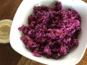 Red cabbage, onions, tomatoes and more make up Funmi's intensely flavored hachumbari slaw.