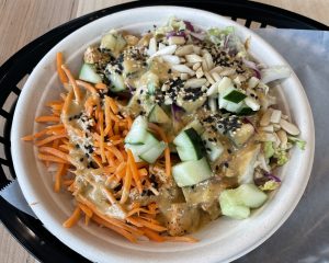The Bangkok bowl offered an appetizing mix of organic fried tofu, cabbage, nuts and chickpeas and more with a delicious, gently fiery Thai peanut sauce.