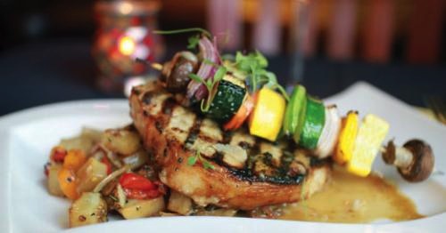 Grilled pork chop at Brix. LEO photo by Ron Jasin.