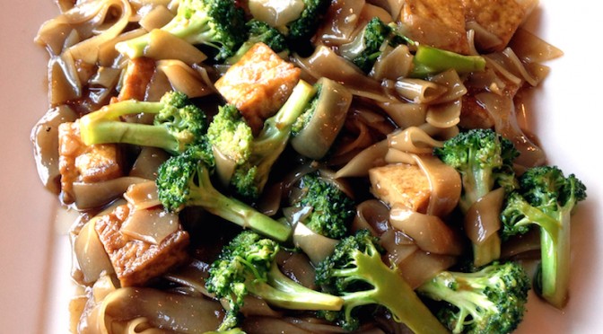 Stir-fry of broccoli, tofu and black beans over tender rice noodles.