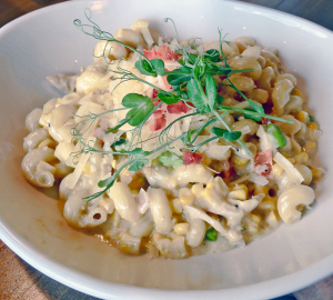 River House's oven-roasted pulled chicken, and cavatappi pasta