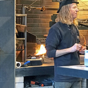 ?Proprietor Bob Hancock at one of Red Hog's two wood-burning ovens.