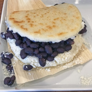 Nahyla’s granos arepa with black beans and queso.