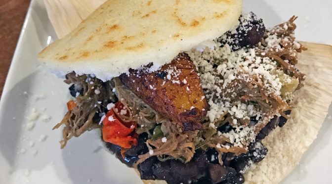 A pabellon arepa stuffed with shredded beef, an iconic Venezuelan dish at Nahyla’s.