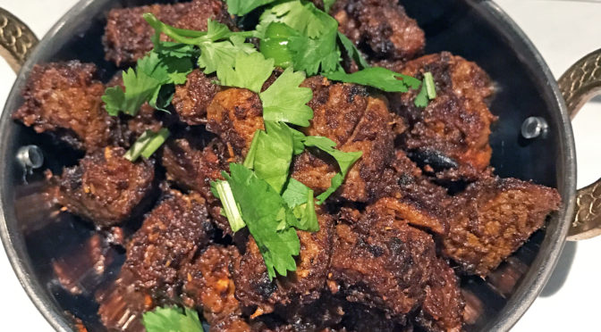 Tikka House’s dry curry of roast lamb with coconut.