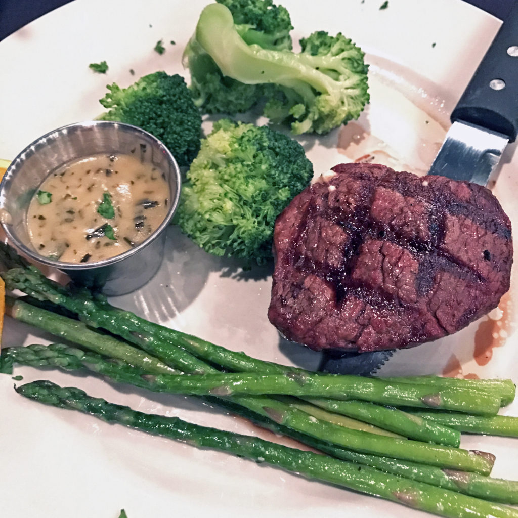 Center-cut beef filet (6-ounce) with Bearnaise sauce at The Blackstone Grille.