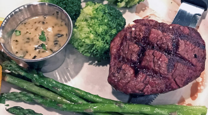 Center-cut beef filet (6-ounce) with Bearnaise sauce at The Blackstone Grille.