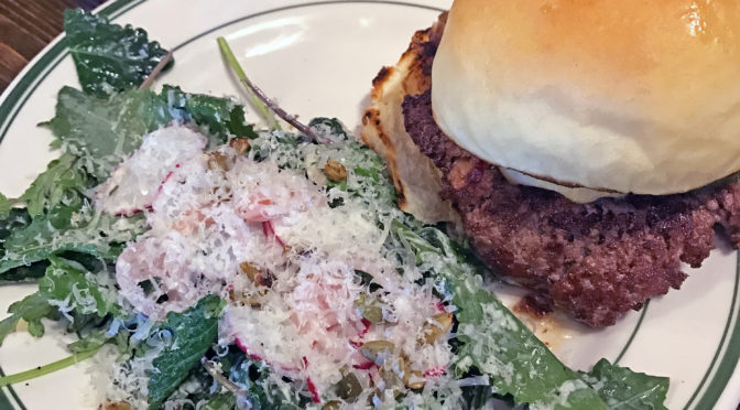 The Southern burger with a side of “What the Kale” salad at Grind.