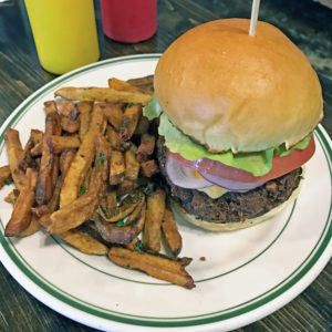 Grind’s house-made veggie burger with a side of house-cut fries.