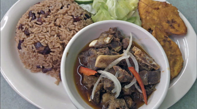 Caribbean Cafe’s cabrit et sauce: stewed goat with Creole seasonings.