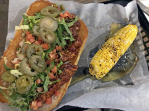 Po’boy and grilled corn at Hull & High Water.