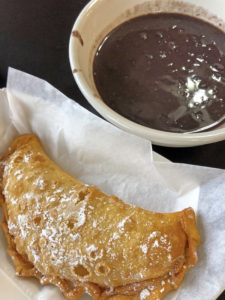 empanada and Cuban black beans