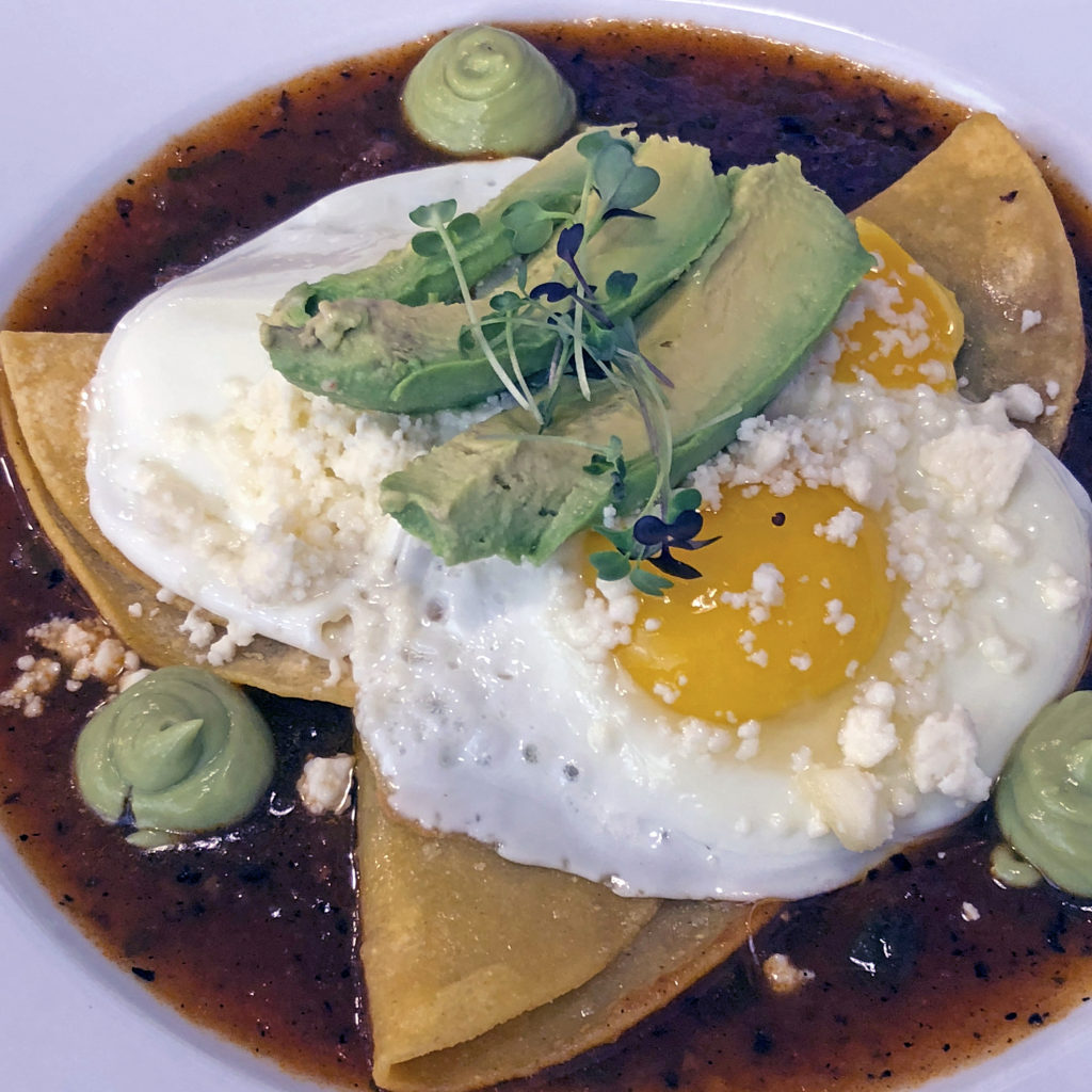 Huevos rancheros, billed as “our signature” dish at Con Huevos.