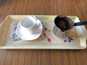 Traditional Turkish coffee service at Aladdin’s Cafe, dark, rich and scented with cardamom.