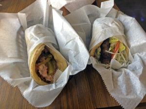 Aladdin’s hearty, hand-made sandwiches: Falafel on left and a fine gyros.