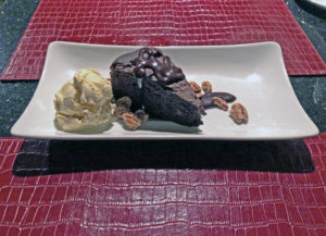 Marketplace’s double chocolate cake with mint-chocolate sauce and vanilla gelato.