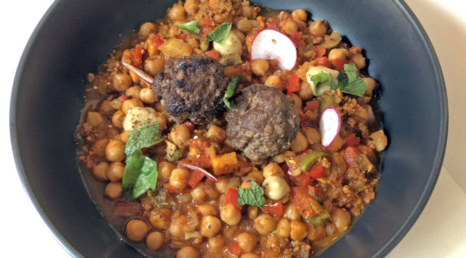 Naïve’s Israeli chickpea tagine is topped with lamb kofta.