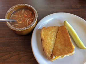 A perfect old-school grilled cheese with vegetable soup at Cottage Inn.