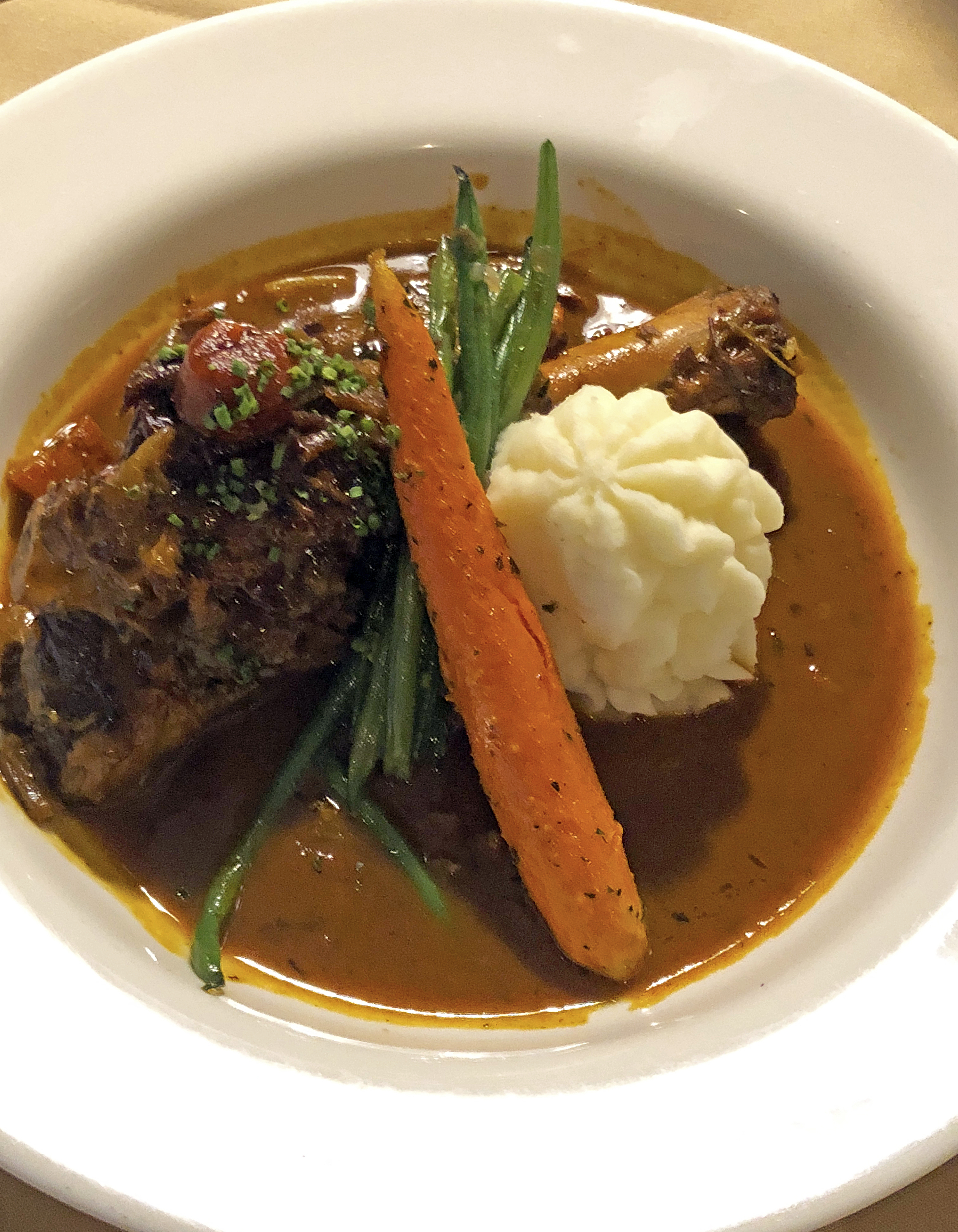 Anoosh Bistro’s braised lamb shank with mashed potatoes.Anoosh Bistro’s braised lamb shank with mashed potatoes.