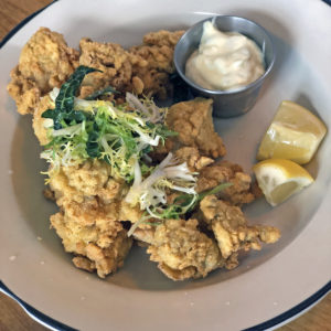 Portage House’s cornmeal-fried Gulf oysters.