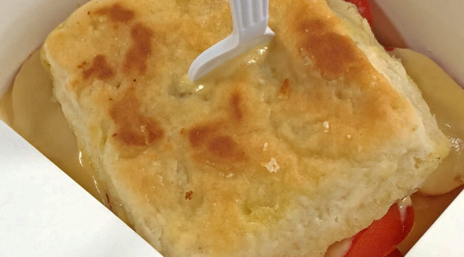 The cheesy ‘mato biscuit at Boujie Biscuit boasts a thick, house-made four-cheese sauce.