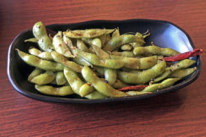 Ramen Inochi’s spicy garlic edamame is fiery, aromatic and addictive.