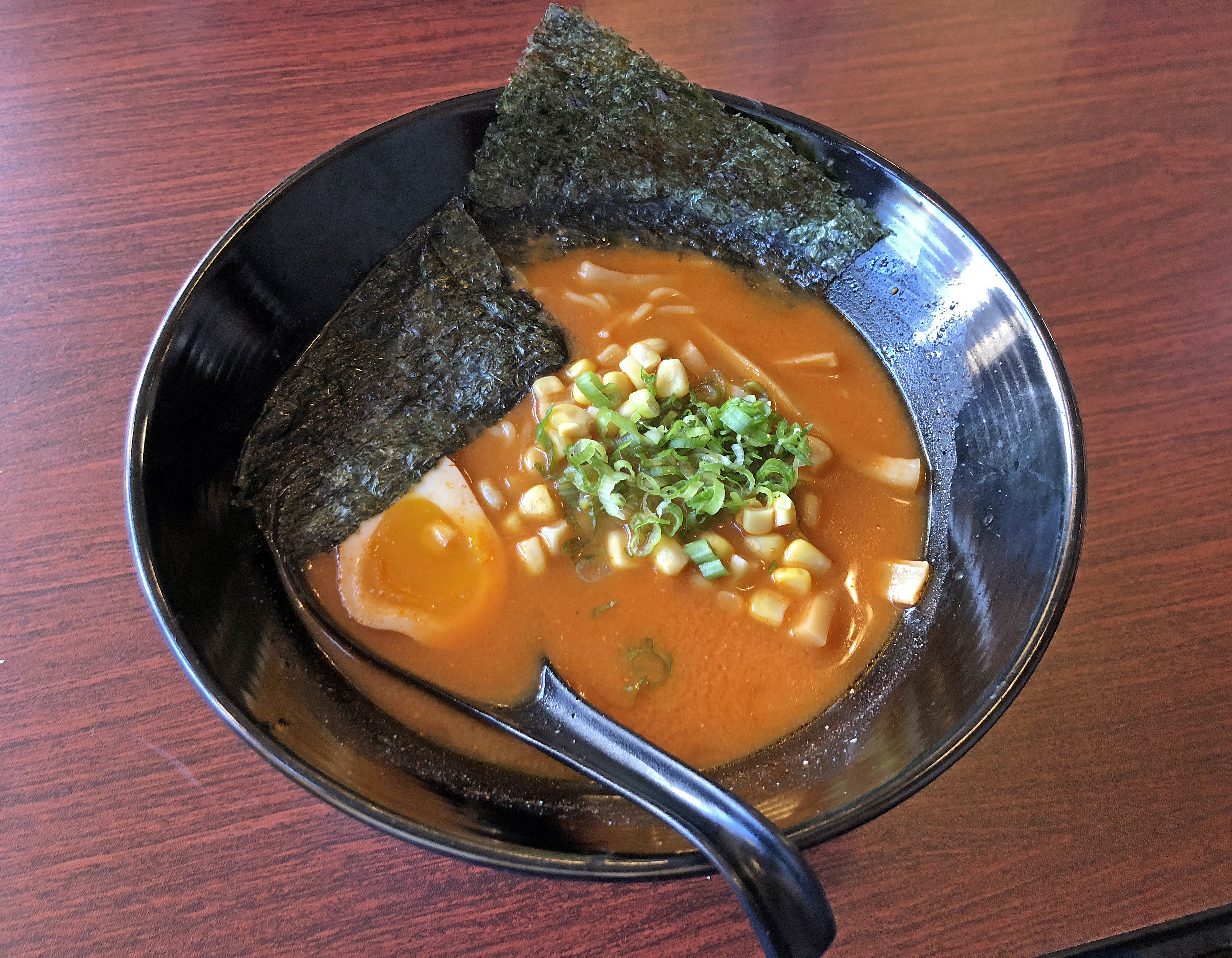 Ramen Inochi’s spicy veggie miso ramen is fiery and delicious, especially with an added order of kimchi.