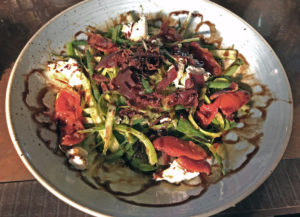 Bean Waiting Long, Le Moo’s salad of haricots verts, asparagus, burrata cheese and crispy country ham.