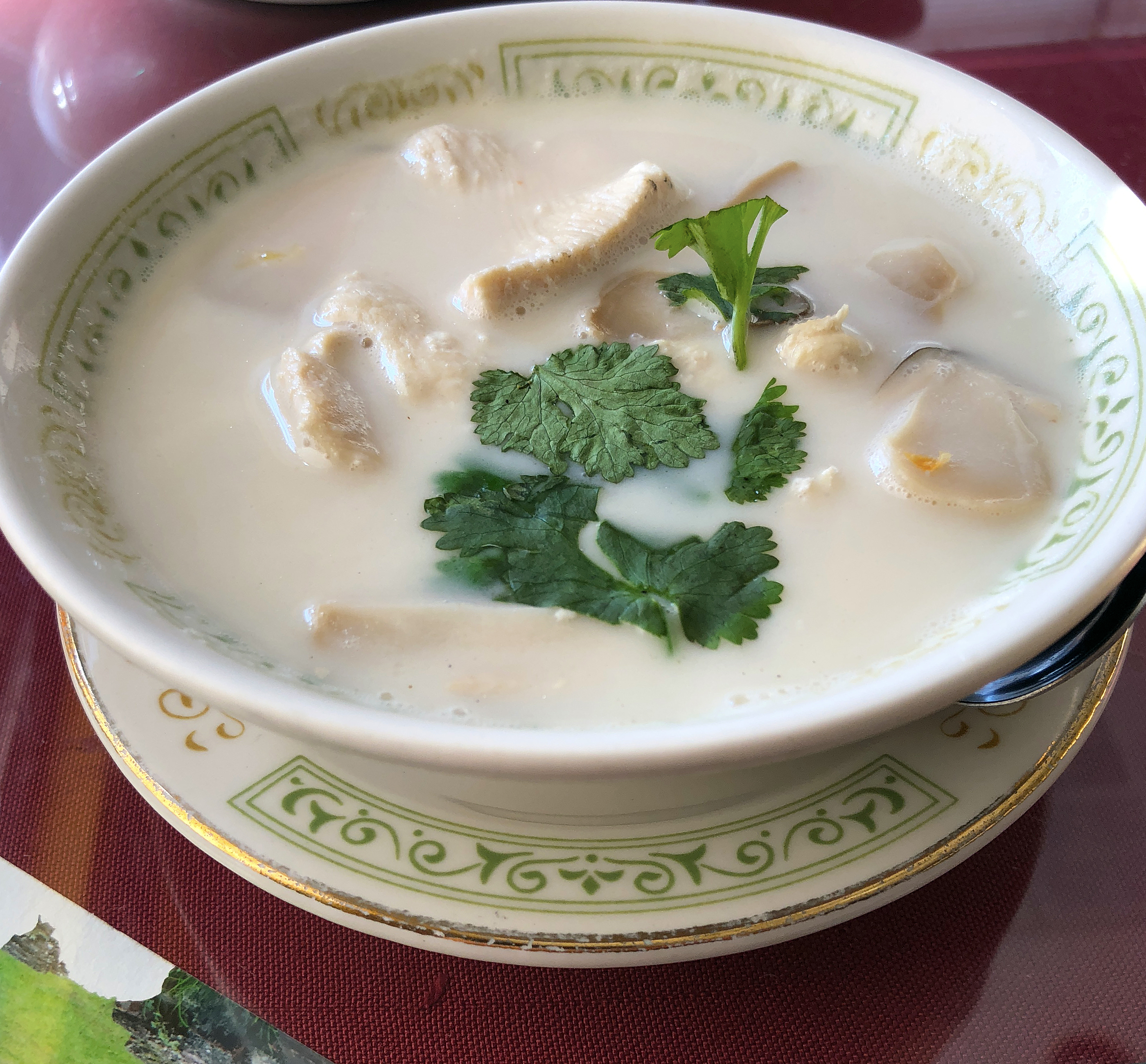 Mai's Thai's Tom Ka Gai, lightly spiced chicken soup.