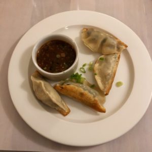 The pan-fried spinach dumpling appetizer at the Pine Room