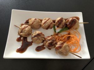 Skewered grilled meatballs, an appetizer at Eatz Vietnamese.