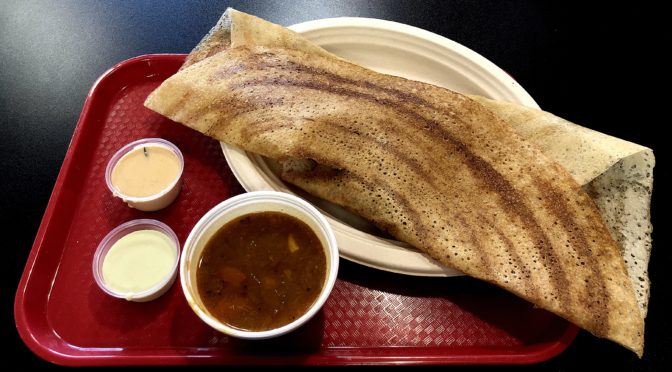 Shreeji Indian’s masala dosa, more than a foot long and packed with spicy goodies.