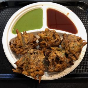 Oversize pakodas, fiery onion-scented Indian fritters, at Shreeji Indian