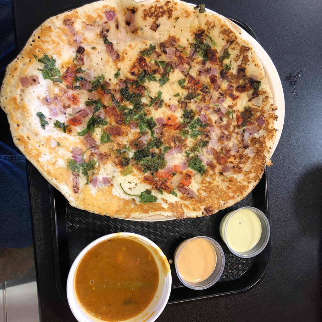 Shreeji Indian’s uttapam looks a bit like a pizza, but its flavors are all Indian.