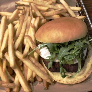 Down One Bourbon Bar’s falafel burger comes on an eggy challah bun.