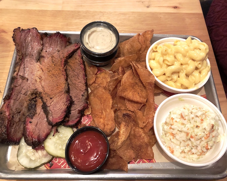 Joe’s Older Than Dirt’s brisket platter with slaw, mac-and-cheese, and house-made chips.