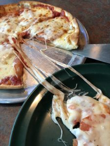 Cheese, cheese, cheese. If you like stringy, stretchy cheese on your pizza, Sal’s piles it on. It’s good, though.