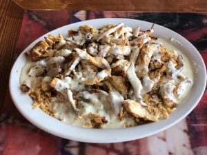 El Mariachi’s arroz con pollo comes in Guanajuato style with a cheese sauce. 