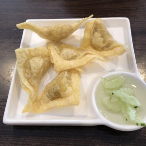 Fried curry puffs at Simply Thai are loaded with curried chicken, potatoes and onions.