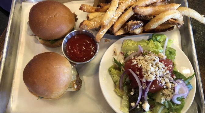 The Table’s meatloaf sliders with watermelon salad and Parmesan fries.