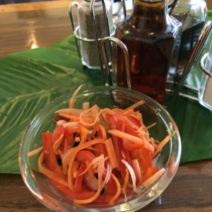 Acharra, colorful fresh-pickled vegetables, at Lola’s Kitchen.