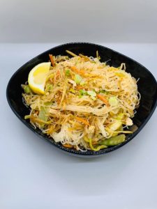 Lola’s Kitchen’s pancit bihon, an iconic Filipino rice-noodle dish. (Photo from Lola's Facebook page.)