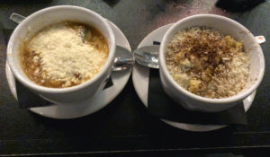 Two hearty side dishes at Noche: Corn esquites and squash calabacitas soup.