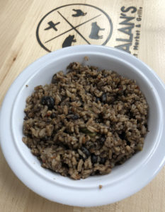 Galan's congri is a traditional Cuban side dish of rice and black beans with tiny veggie dice.