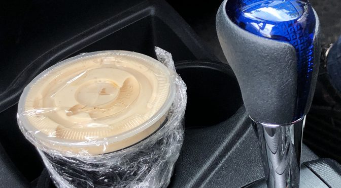 Irish Rover's bar staff seals up a full pint of Guinness safely with plastic wrap and a tight lid. And it fits in my cup holder! (Leave it sealed until you get home, though!)