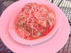 Selena's six-layer spinach lasagna makes a filling comfort meal. Sun filtering through our red patio umbrella tinted everything a haunting pink.