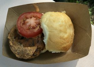 Oskar's veggie burger with spicy sauce is the same meatless burger offered at sister shop Grind Burger Kitchen.