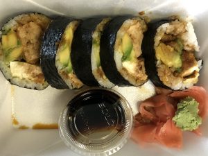 The tofu roll at ToGo Sushi is oversize, filled with fried silken tofu and avocado with its nori seaweed wrapper on the outside.