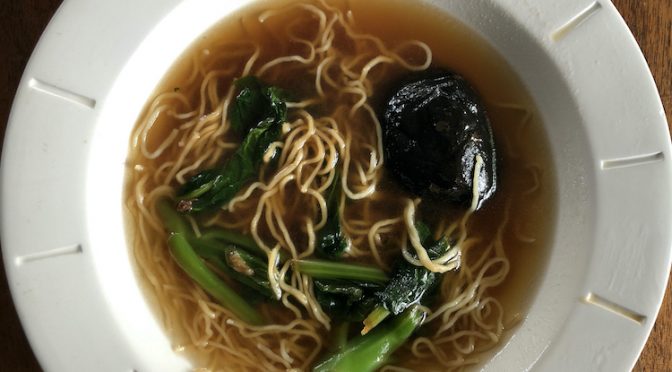 Chinese broccoli and blackmushroom noodle soup comes with the broth separate for you to mix at serving time.